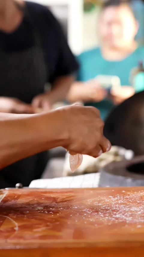 Chef Hands Kneading and Shaping Roti Dough in Professional Kitchen Stock Footage 340183218