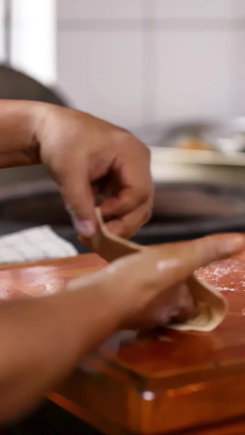 Chef Hands Kneading and Stretching Roti Dough in Commercial Kitchen Stock Footage 339514939
