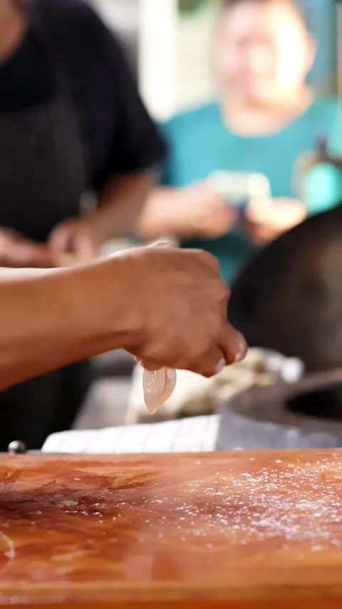 Chef Hands Kneading and Stretching Dough for Roti in Restaurant Kitchen Stock Footage 339752339