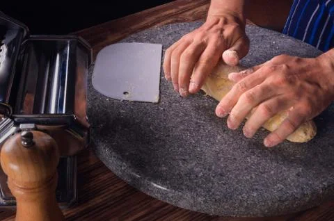 Chef hands kneading dough for bread Stock Photos