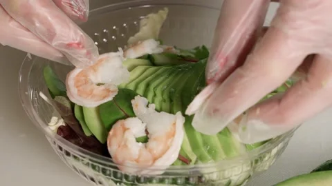 Chef hands making healthy seafood salad, close-up Stock Footage 155433067