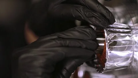 Chef hands making a hole in the cupcake for filling, vertical video Stock Footage 297623939