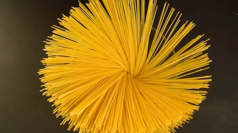 Chef hands put Spaghetti in Bowl Top view Slow motion Stock Footage 104063189