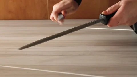 Chef hands sharpening knife. Stock Footage 144792796
