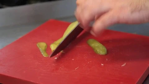 Chef hands slice cut chop green ecologic pickled sour cucumber with knife  Stock Footage 83587338