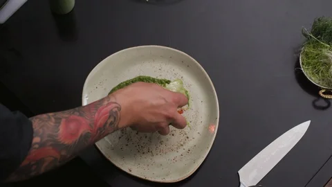 Chef hands slice cut food on plate with knife dish seasoning tasty soup healthy Stock Footage 103290864