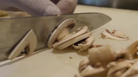 Chef Hands Slicing Fresh Champignon Mushrooms for Traditional Italian Pizza Stock Footage 337677765