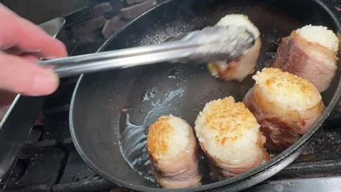 Chef Hands Turning Pork Wrapped Rice Balls With Tongs Nikumaki Onigiri Japan Stock-Footage 344727556