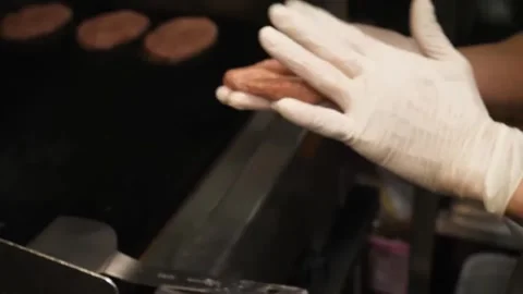 Chef Hands in White Gloves Shaping Fresh Raw Beef Burger Patty in Commercial Res Stock-Footage 347687890