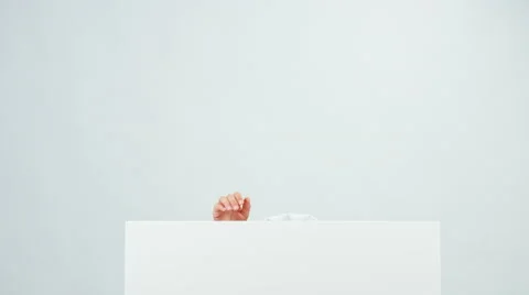 Chef hides behind the whiteboard looking at camera and laughing with teeth Stock Footage 67262200