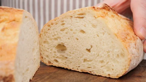 Chef hold fresh bread in hands Stock-Footage 228690934