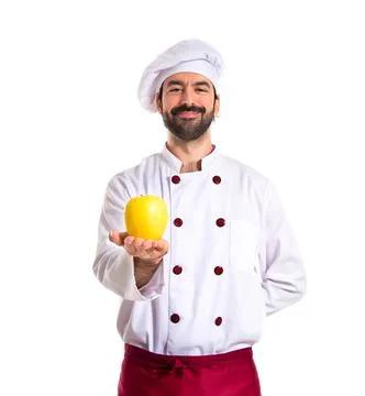 Chef holding an apple Stock Photos