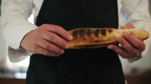 Chef holding a bread Stock Footage 39379204