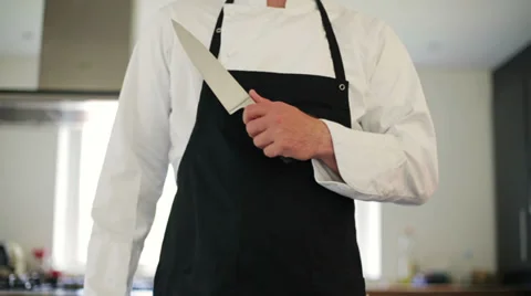 Chef holding knife Stock Footage 39379559