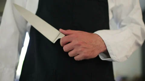 Chef holding knife Stock Footage 39379637