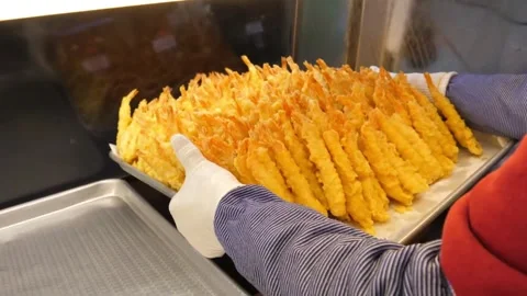 Chef Holding Large Tray of Crispy Deep Fried Golden Shrimp Tempura at Korean Str Stock-Footage 343028919