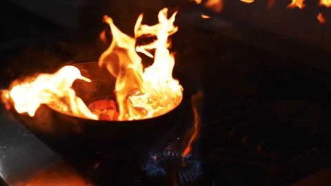 Chef is holding pan or wok and stirring food. Stock Footage 101244634
