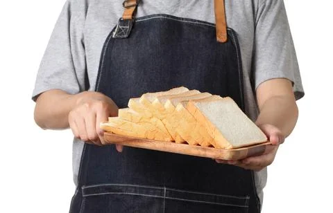 Chef holding toast wheat bread sliced on white background Stock Photos
