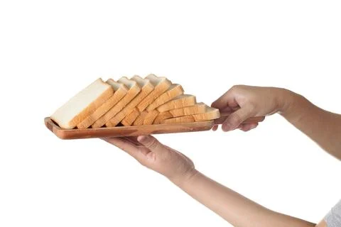 Chef holding toast wheat bread sliced on white background Stock Photos