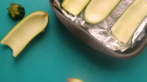 Chef home preparing delicious courgette recipe at home -8s Stock Footage 134906324