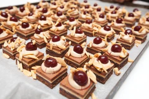 Chef in hotel or restaurant kitchen making dessert for dinner Stock Photos