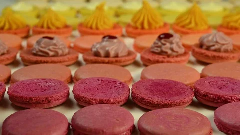 Chef with injector squeezing macaron cream Stock Footage 120400869