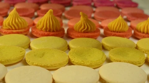 Chef with injector squeezing macaron cream Stock Footage 120401024