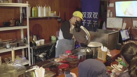 The chef of a Japanese restaurant Stock Footage 220934096