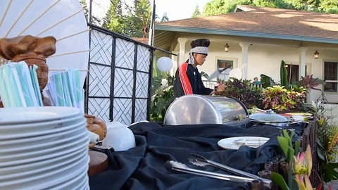 Chef juggling knives Stock Footage 86339024