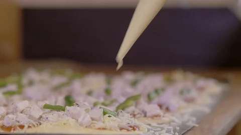 Chef on a kitchen decorating pie Stock Footage 75059588