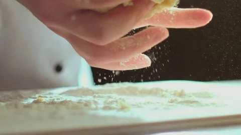 A chef is kneading dough for cakes Stock Footage 75894125