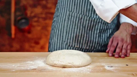 Chef kneading dough Stock Footage 88899901