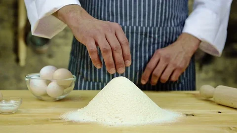 Chef kneading dough Stock Footage 88900014