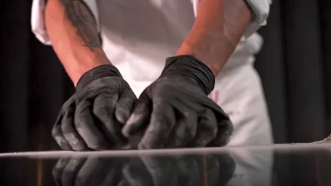 Chef kneading dough in kitchen Stock Footage 168206473