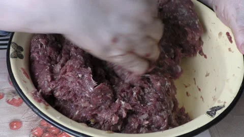 The chef kneads the deer minced meat. healthy food concept Stock Footage 153643880