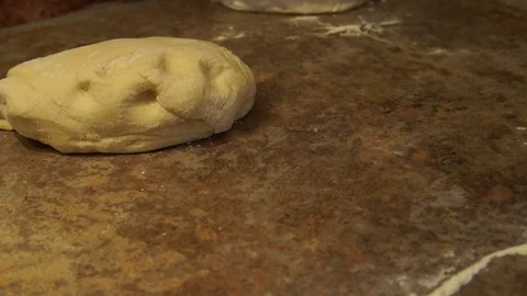 Chef kneads the dough. Chef preparing pizza. Making pizza. Cooking process Stock Footage 97999955