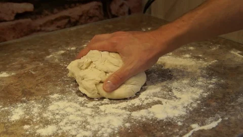 Chef kneads the dough. Chef preparing pizza. Making pizza. Cooking process Stock Footage 98000008