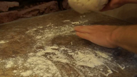 Chef kneads the dough. Chef preparing pizza. Making pizza. Cooking process Stock Footage 98000043