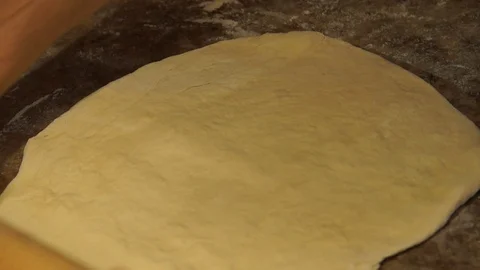 Chef kneads the dough. Chef preparing pizza. Making pizza. Cooking process Stock Footage 98000230