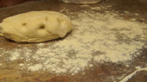 Chef kneads the dough. Chef preparing pizza. Making pizza. Cooking process Stock Footage 98122840