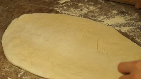 Chef kneads the dough. Chef preparing pizza. Making pizza. Cooking process Stock Footage 98122902