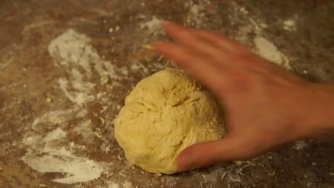 Chef kneads the dough. Chef preparing pizza. Making pies. Cooking process Stock Footage 99333134