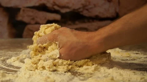 Chef kneads the dough. Chef preparing pizza. Making pies. Cooking process Stock Footage 99741564