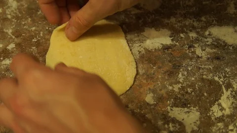 Chef kneads the dough. Chef preparing pizza. Making pies. Cooking process Stock Footage 99742202