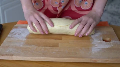 Chef kneads the dough Stock Footage 76989132