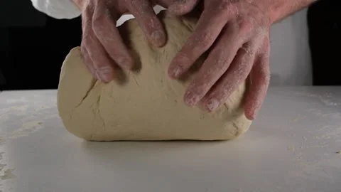 Chef kneads dough Stock Footage 225519109