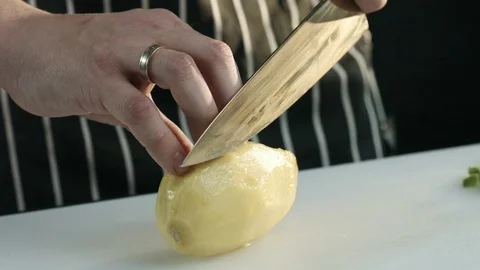 Chef knife cut the mango on the Board Stock Footage 79900165