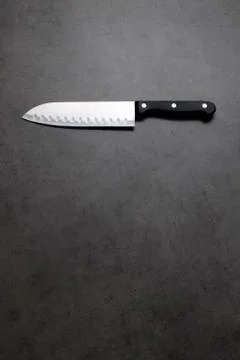 Chef knife on a dark gray table 스톡 사진