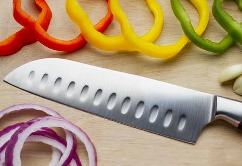 Chef knife during food prep Foto stock