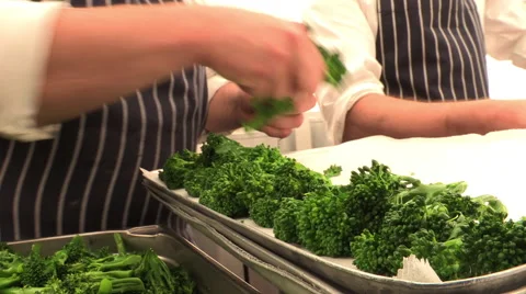 Chef laying out broccoli Stock Footage 47527672